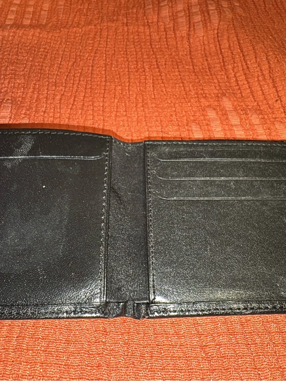 Yves Saint Laurent Black Leather Bi-Fold Wallet